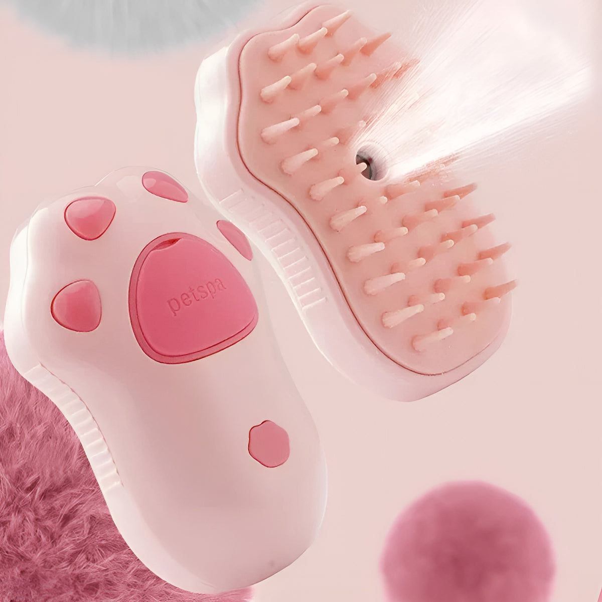 Pink paw-shaped pet steam brush releasing mist